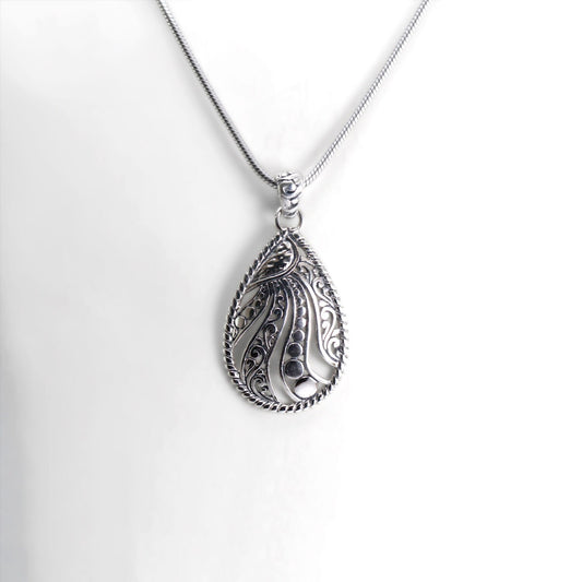 tear drop pendant 925 sterling silver decorated with abstract filigree and cable edge