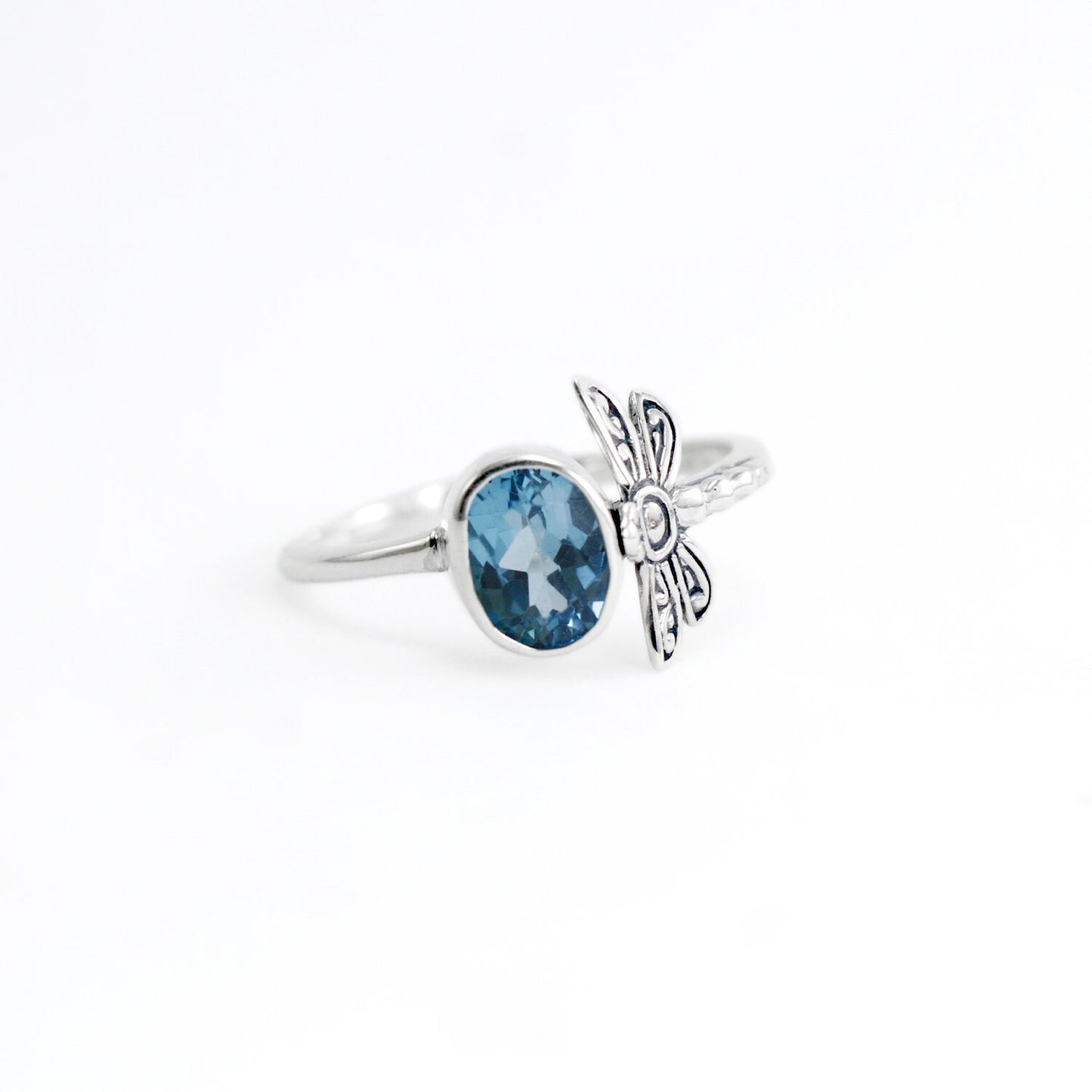 Blue topaz ring set in 925 sterling silver decorated with beautiful dragonfly