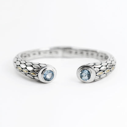 hinged bangle 925 sterling silver with genuine blue topaz decorated with 18K gold accent and snake skin pattern