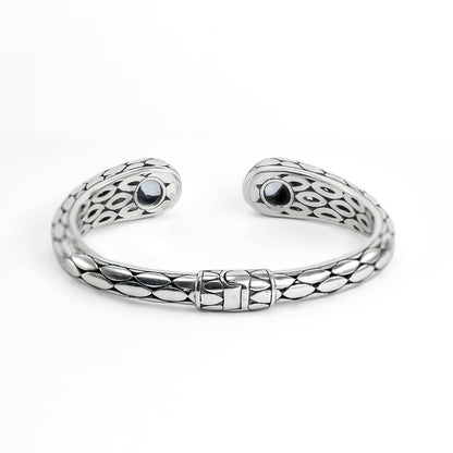 hinged bangle 925 sterling silver with genuine blue topaz decorated with 18K gold accent and snake skin pattern