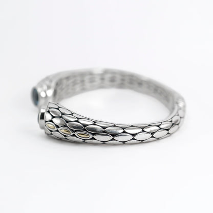 hinged bangle 925 sterling silver with genuine blue topaz decorated with 18K gold accent and snake skin pattern