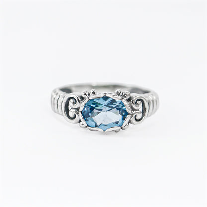 blue topaz ring 925 sterling silver decorated with cable style and open work filigree
