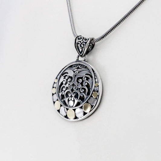 round pendant 925 sterling silver with 18K gold carving decorated with filigree ornament