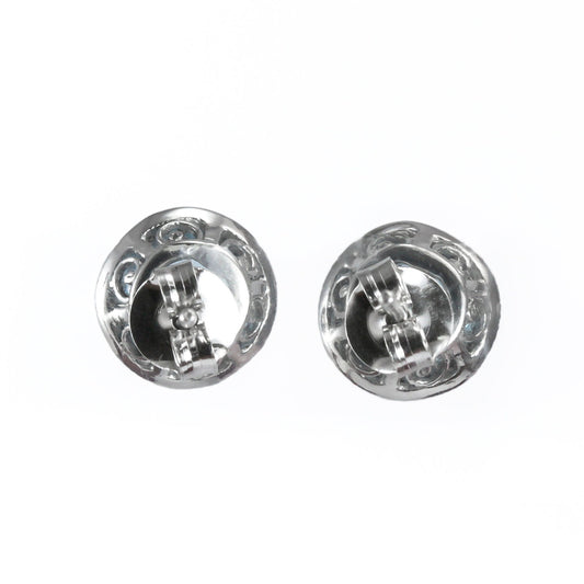 Blue Topaz Stud earrings set in 925 sterling silver decorated with white topaz