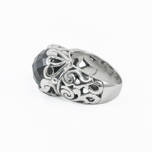 Black onyx ring set in 925 sterling silver decorated with filigree ornament