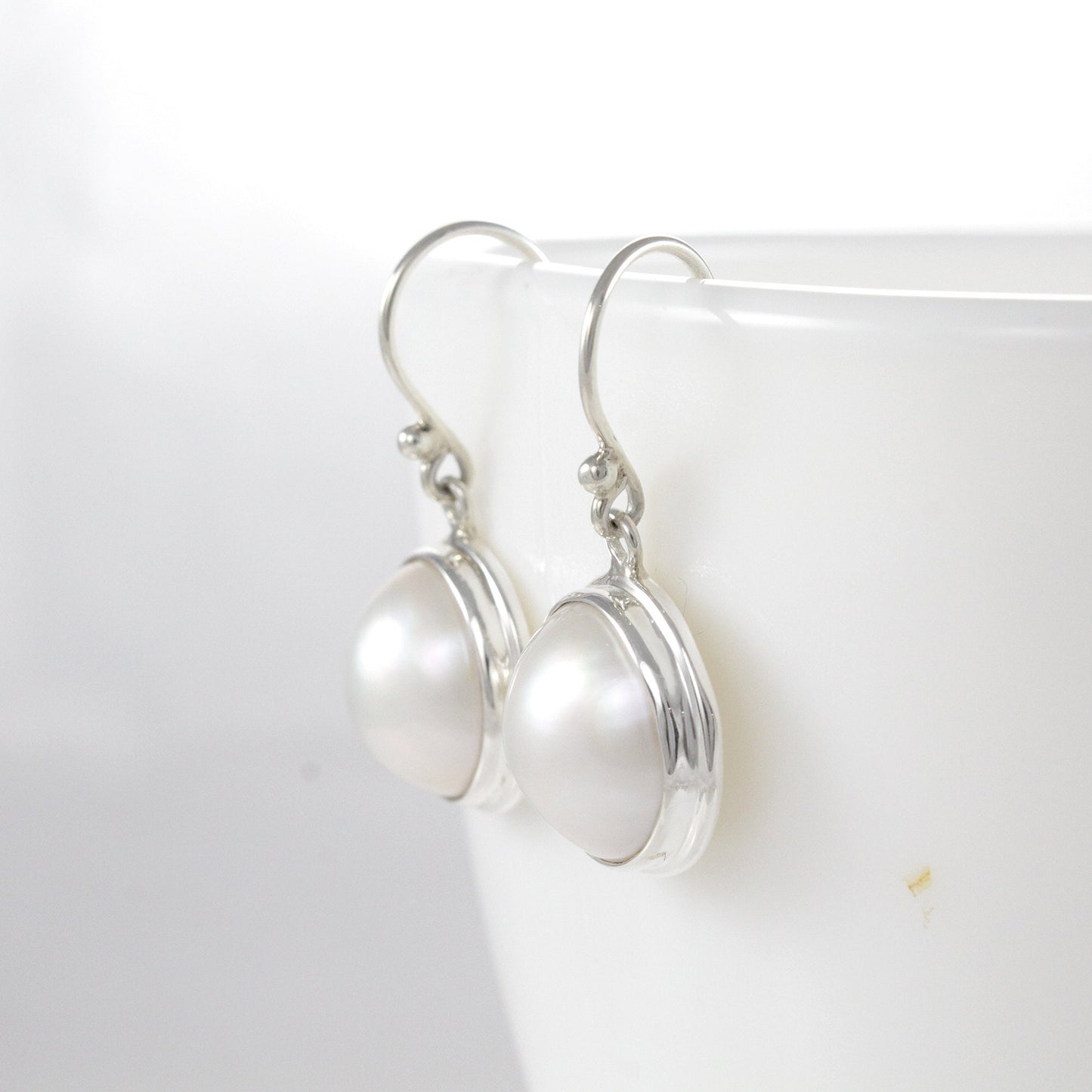 Beautiful dangle & drop earrings with genuine 14 mm round mabe pearl bezel set on handmade 925 sterling silver