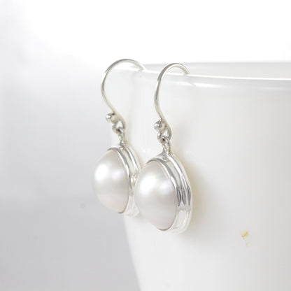 Beautiful dangle & drop earrings with genuine 14 mm round mabe pearl bezel set on handmade 925 sterling silver