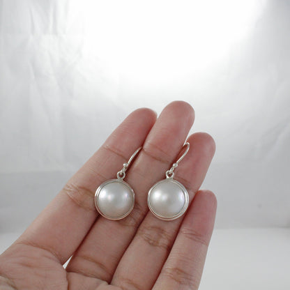 Beautiful dangle & drop earrings with genuine 14 mm round mabe pearl bezel set on handmade 925 sterling silver