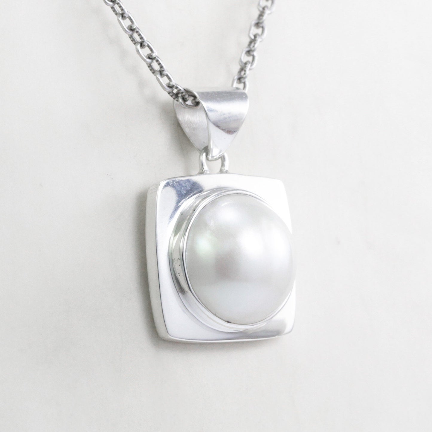 white mabe pearl pendant 925 sterling silver with square doom frame