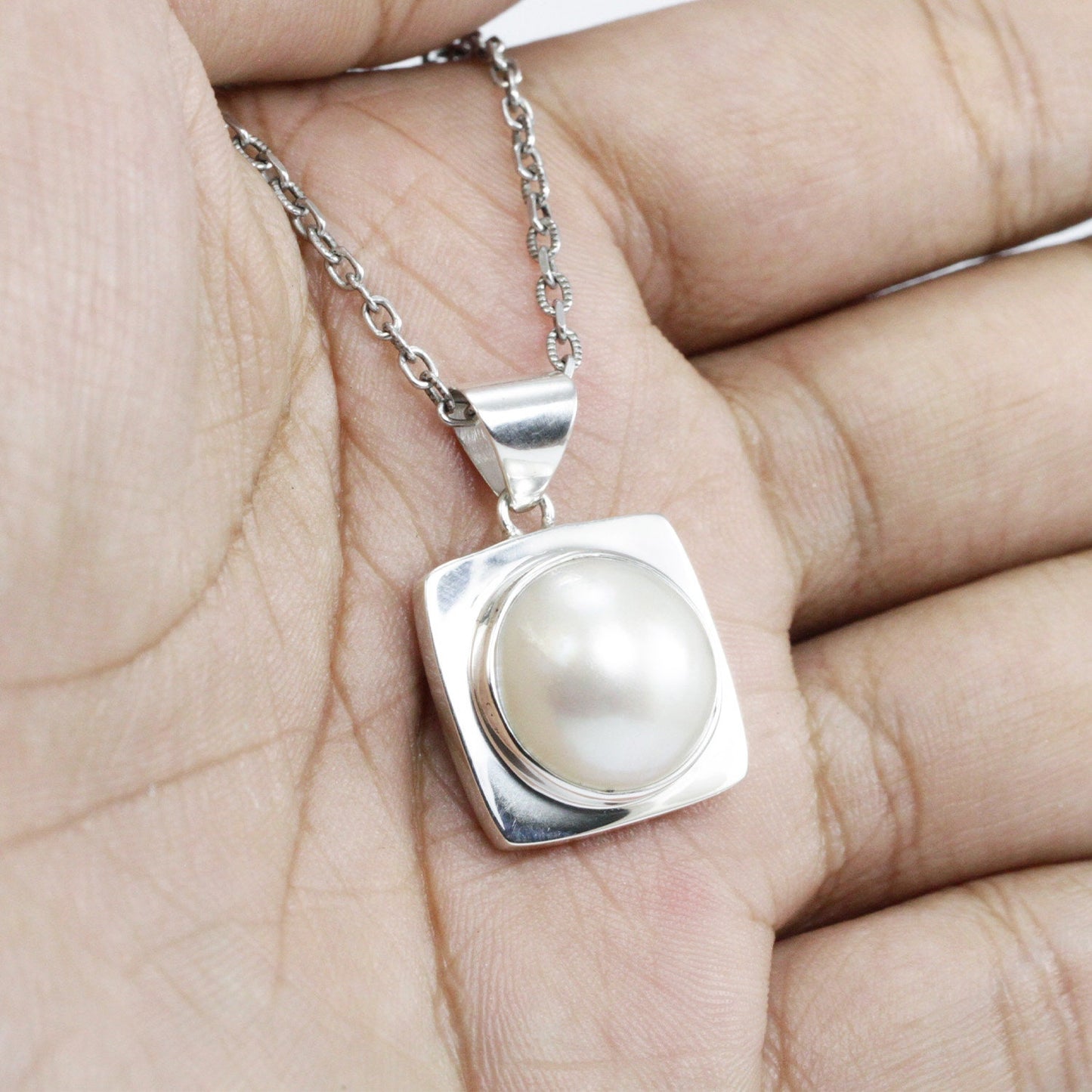 white mabe pearl pendant 925 sterling silver with square doom frame