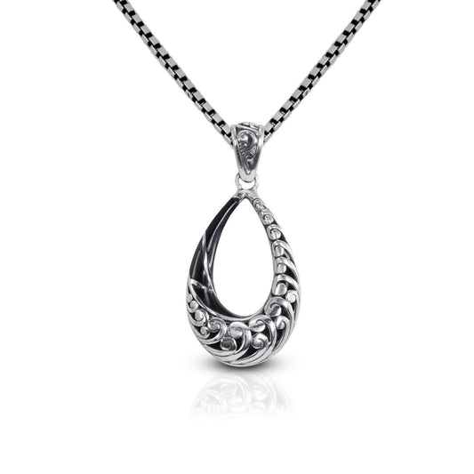 Tear drop pendant 925 sterling silver decorated with swirl filigree ornament and natural black shell
