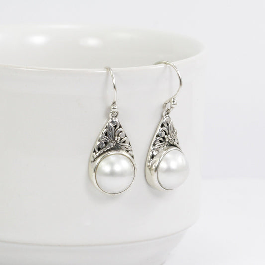 white mabe pearl earrings 925 sterling silver decorated with dragonfly filigree ornament