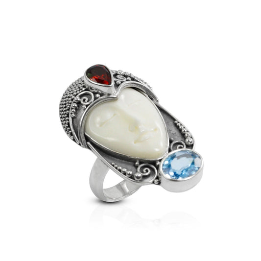 face ring 925 sterling silver with cow bone carving, genuine blue topaz and natural red garnet