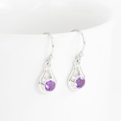 amethyst earrings round shape set in 925 sterling silver decorated with white filigree ornament bezel