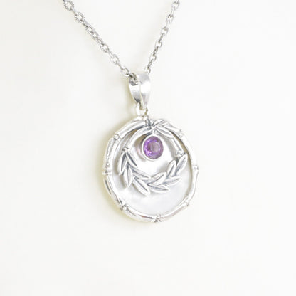 amethyst pendant with 925 sterling silver leaf frame and decorated with genuine white shell