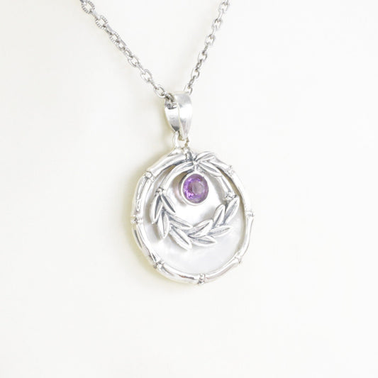amethyst pendant with 925 sterling silver leaf frame and decorated with genuine white shell