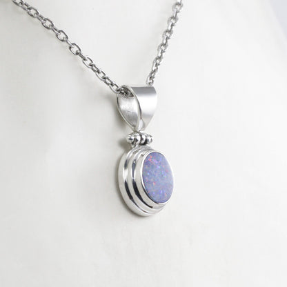 Australian Fire Opal Pendant set in Handmade 925 Sterling Silver with Bezel
