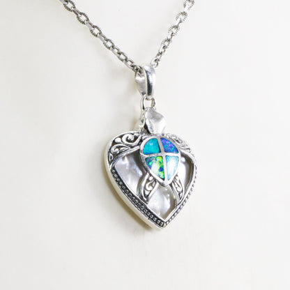 Turtle pendant 925 sterling silver decorated with swirl filigree ornament, white shell and created opal