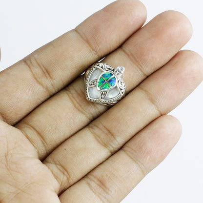 turtle ring 925 sterling silver decorated with created opal and natural white shell