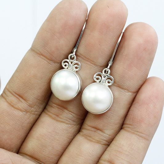White mabe pearl earrings 925 sterling silver decorated with swirl filigree