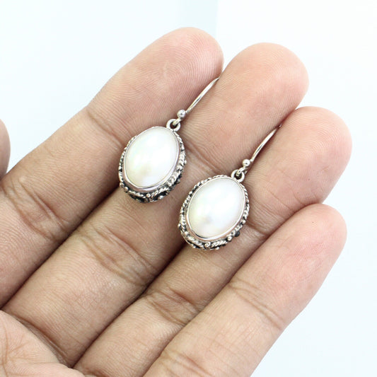 oval white mabe pearl earrings 925 sterling silver decorated with woven ornament bezel