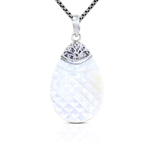Tear drop pendant with genuine white shell set in 925 sterling silver decorated with Bali swirl filigree ornament