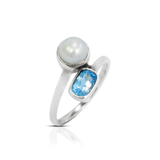 bypass ring with genuine blue topaz and freshwater pearl set in 925 sterling silver