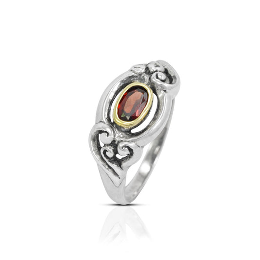 red garnet ring 925 sterling silver decorated with gold bezel and swirl filigree ornament