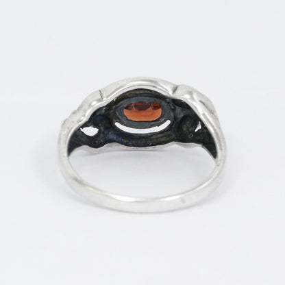 red garnet ring 925 sterling silver decorated with gold bezel and swirl filigree ornament