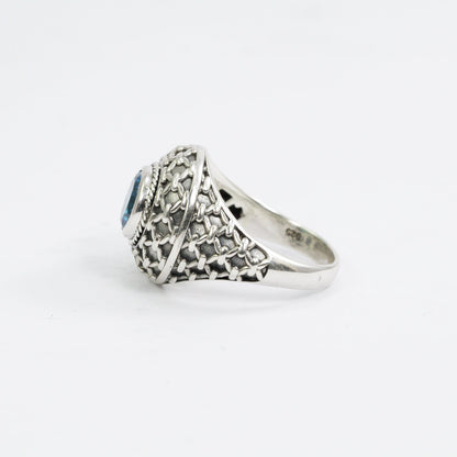 doom ring with genuine blue topaz zirconia decorated with woven web ornament