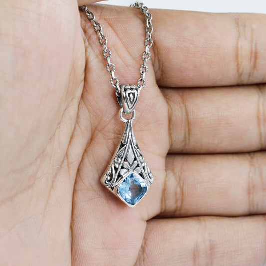 art deco inspired pendant 925 sterling silver with genuine blue topaz decorated with swirl filigree ornament