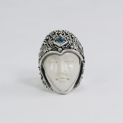 face ring 925 sterling silver with genuine blue topaz and cow bone carving and filigree ornament