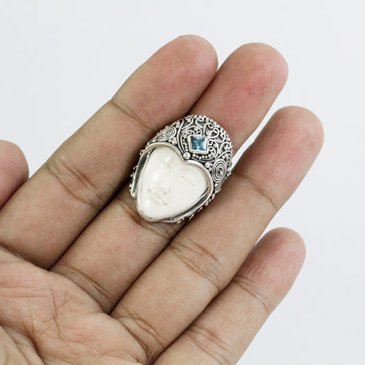 face ring 925 sterling silver with genuine blue topaz and cow bone carving and filigree ornament