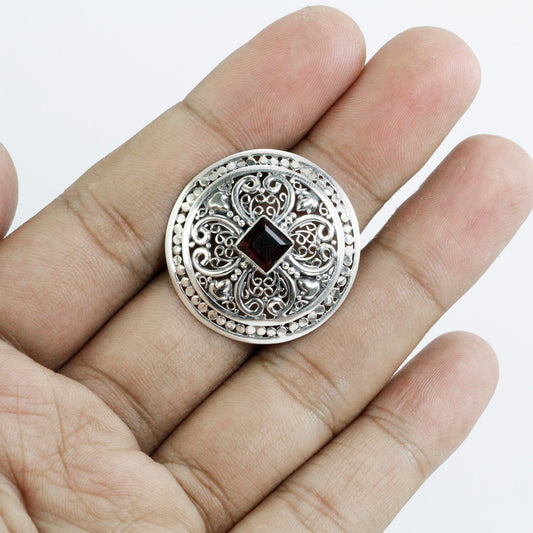 Circle ring 925 sterling silver with natural garnet decorated with delicate filigree ornament