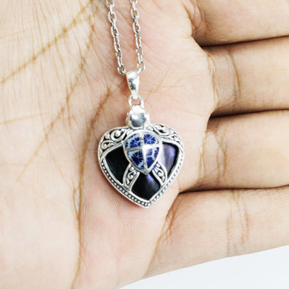 Turtle pendant 925 sterling silver decorated with swirl filigree ornament, black shell and genuine blue coral