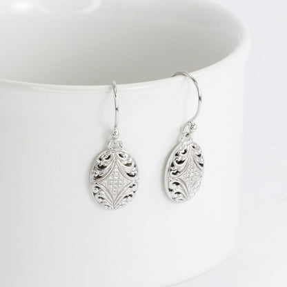 oval earrings 925 sterling silver decorated with open work filigree and white zircon