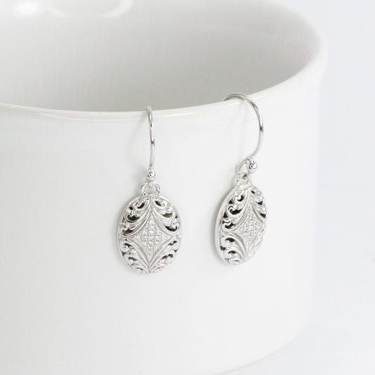 oval earrings 925 sterling silver decorated with open work filigree and white zircon