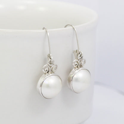 White mabe pearl earrings 925 sterling silver decorated with swirl filigree
