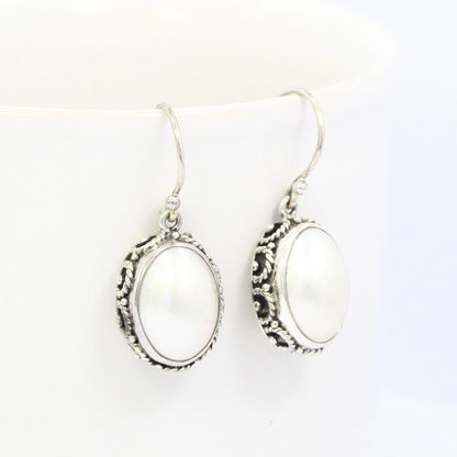 oval white mabe pearl earrings 925 sterling silver decorated with woven ornament bezel