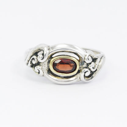 red garnet ring 925 sterling silver decorated with gold bezel and swirl filigree ornament