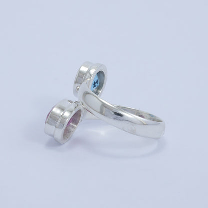 red ruby ring 925 sterling silver bypass style decorated with genuine blue topaz
