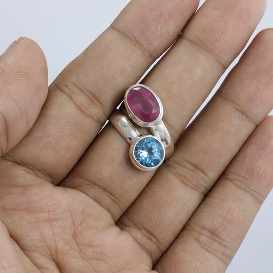 red ruby ring 925 sterling silver bypass style decorated with genuine blue topaz