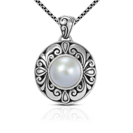 Round pendant 925 sterling silver with genuine white mabe pearl decorated with swirl filigree Bali inspired