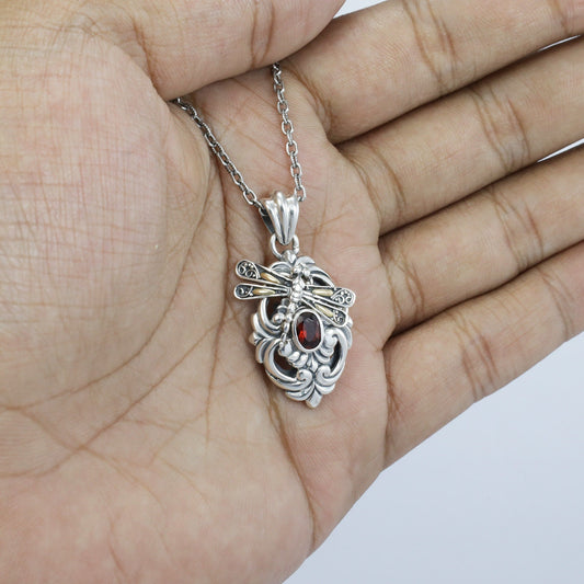 925 sterling silver pendant with genuine red garnet decorated with 18K yellow gold dragonfly and ornament art