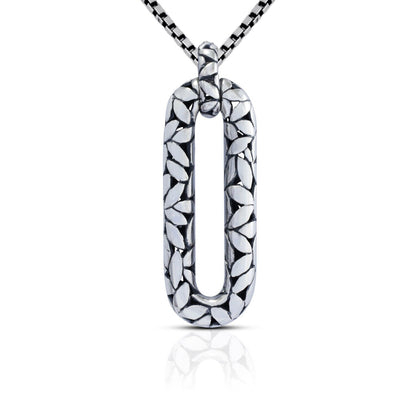 925 sterling silver rectangular pendant decorated with seed ornament and antique finishing