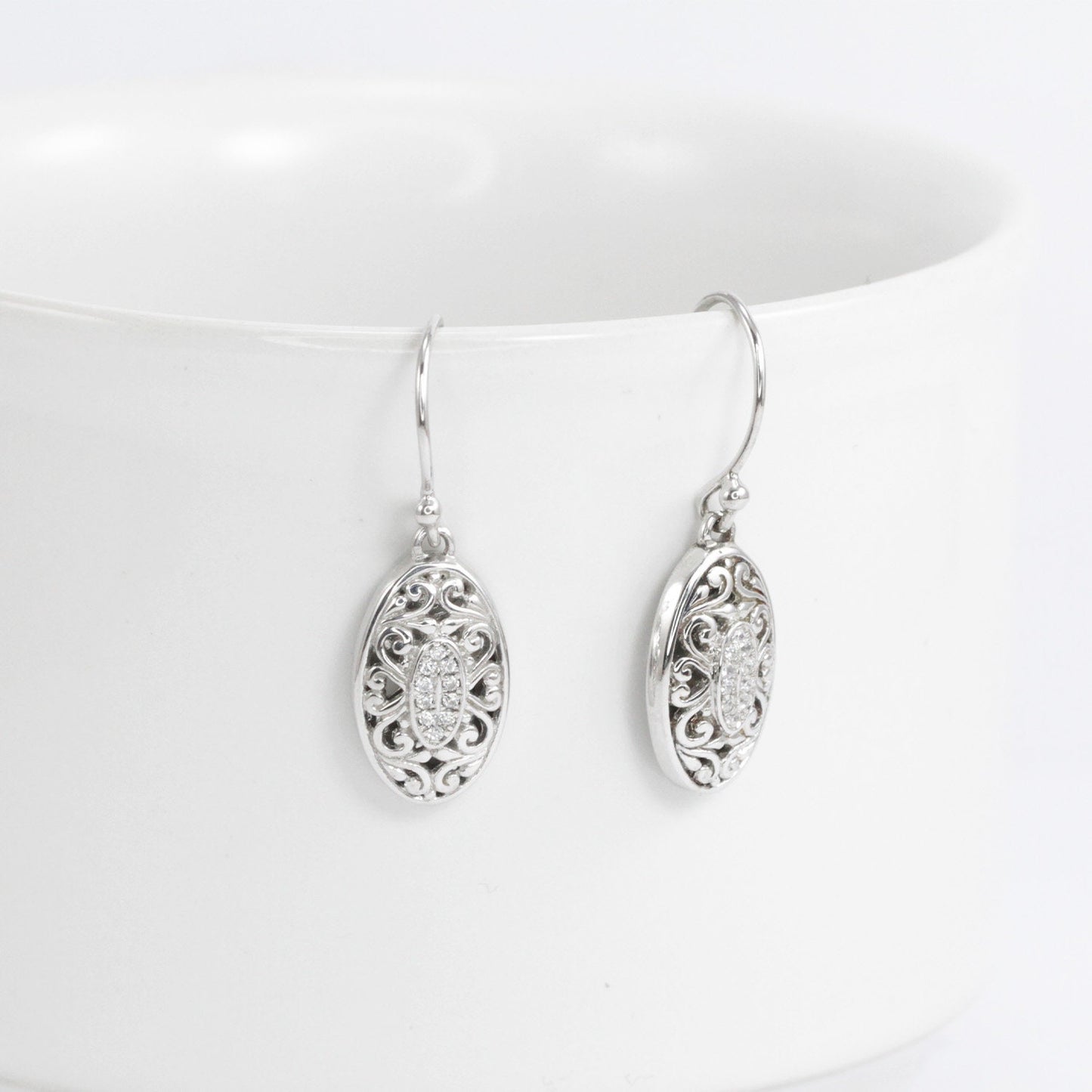 925 sterling silver earrings oval shape decorated with open work filigree and white zirconia