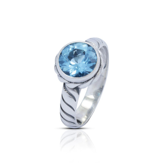 round blue topaz ring 925 sterling silver decorated with cable style ornament