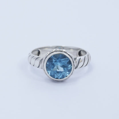 round blue topaz ring 925 sterling silver decorated with cable style ornament
