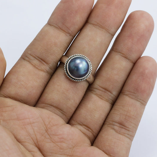 Round blue mabe pearl ring 925 sterling silver decorated with cable edge ornament