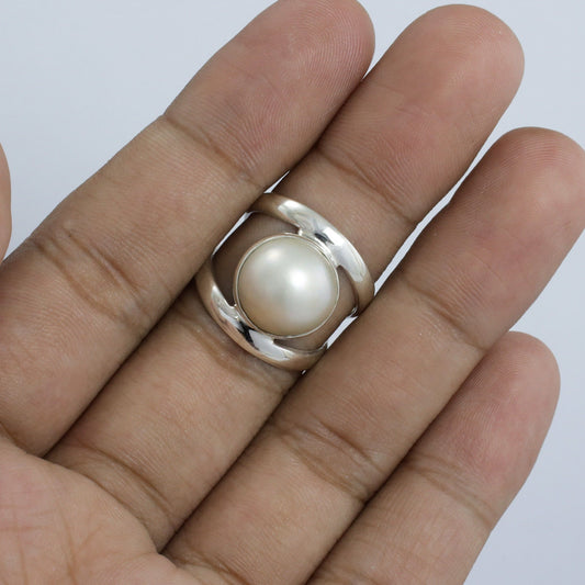 white mabe pearl ring set in 925 sterling silver split shank style with high polish finishing